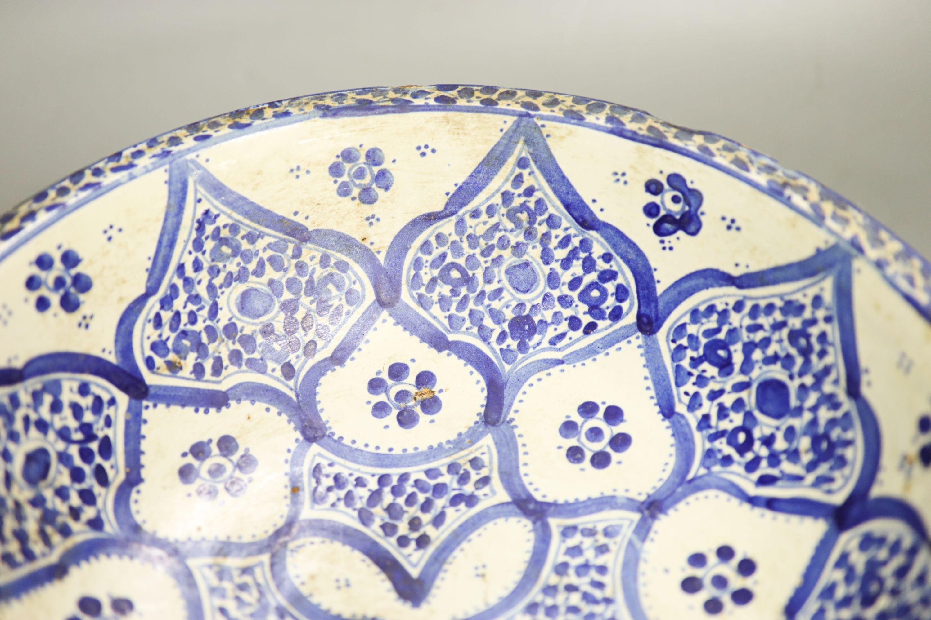 An Iznik style blue and white bowl 30cm